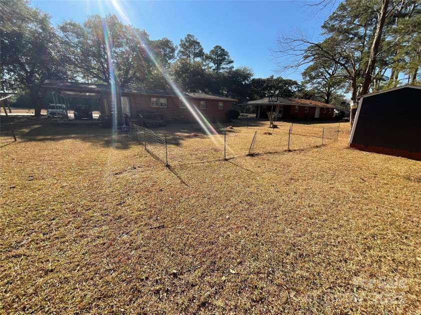 202 Marcellus Street, Laurinburg, NC 28352.  MLS# CAR4248496, YatesRealty ID 14157. Backyard