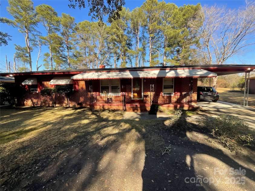 202 Marcellus Street, Laurinburg, NC 28352.  MLS# CAR4248496, YatesRealty ID 14157. Front of Home