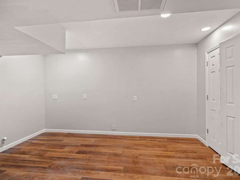 1845 Flowes Store Road, Concord, NC 28025.  MLS# CAR4353597, YatesRealty ID 14164. Basement office/bedroom