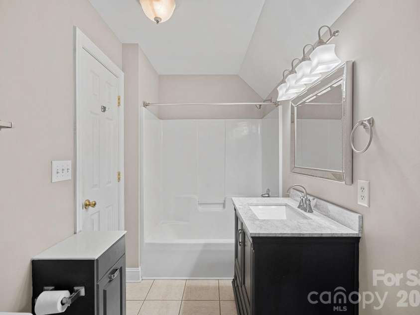 1845 Flowes Store Road, Concord, NC 28025.  MLS# CAR4353597, YatesRealty ID 14164. Upstairs Full Bath w/Laundry Chute