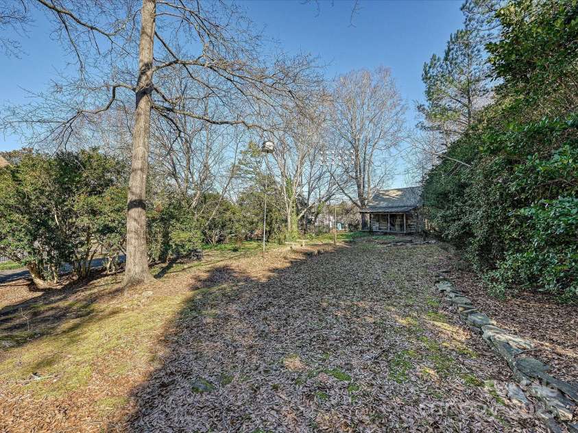 306 Garrison Drive, Kings Mountain, NC 28086.  MLS# CAR4329391, YatesRealty ID 14173. Backyard looking towards Log Cabin