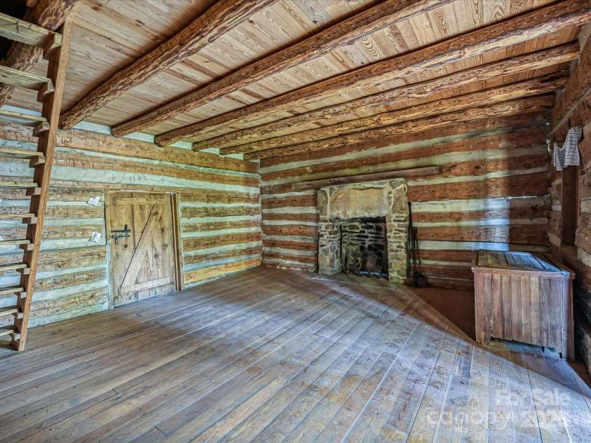 306 Garrison Drive, Kings Mountain, NC 28086.  MLS# CAR4329391, YatesRealty ID 14173. Lower Level and Stone Fireplace Log Cabin 