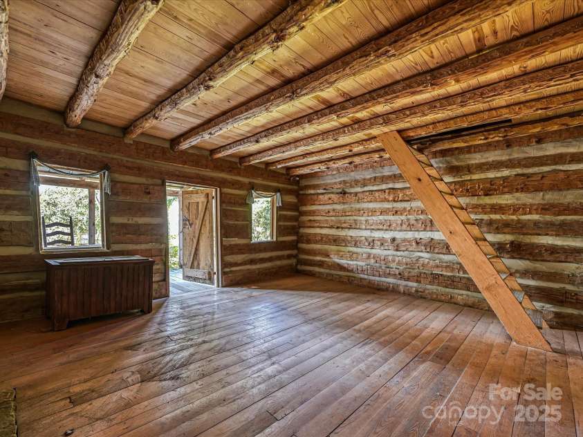 306 Garrison Drive, Kings Mountain, NC 28086.  MLS# CAR4329391, YatesRealty ID 14173. Lower Level Log Cabin