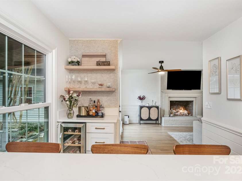 6525 Castlegate Drive, Charlotte, NC 28226.  MLS# CAR4223050, YatesRealty ID 14179. Mini bar with wine refrigerator