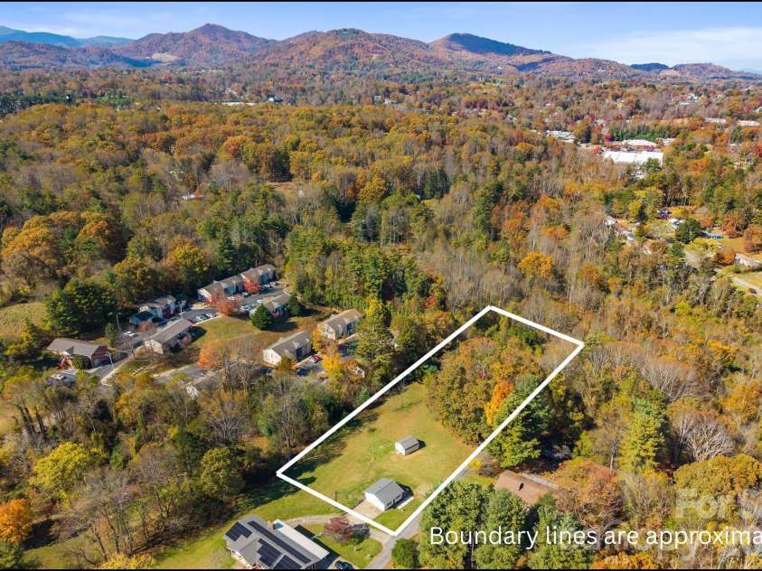 24 Ian River Drive, Asheville, NC 28806.  MLS# CAR4316888, YatesRealty ID 1418. 2.13 acres with approximate boundary lines.