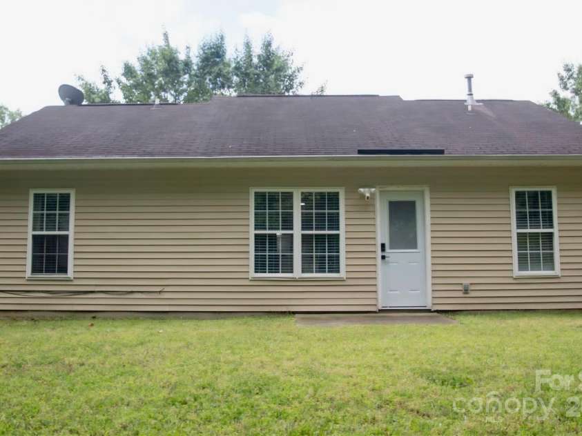 1623 Flagler Lane, Charlotte, NC 28216.  MLS# CAR4257918, YatesRealty ID 14180. Back of house