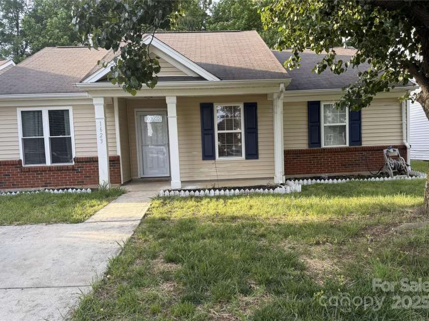 1623 Flagler Lane, Charlotte, NC 28216.  MLS# CAR4257918, YatesRealty ID 14180. Front of house