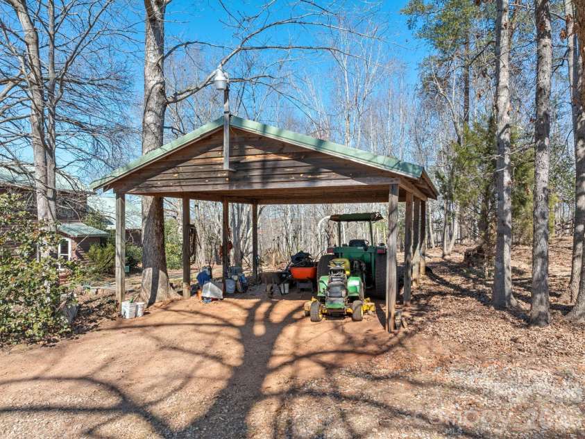 405 Loop Road, Campobello, SC 29322.  MLS# CAR4370899, YatesRealty ID 14181. Carport
