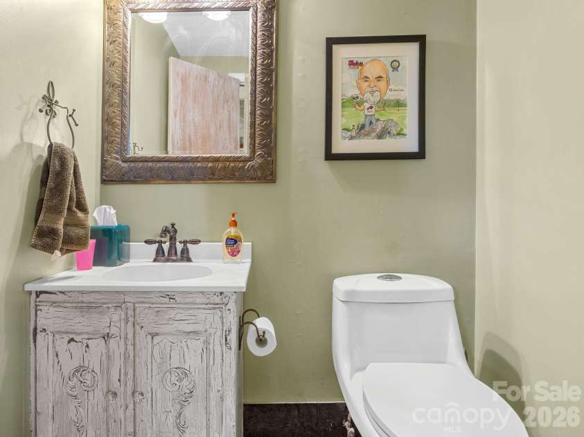 405 Loop Road, Campobello, SC 29322.  MLS# CAR4370899, YatesRealty ID 14181. Main floor half bath