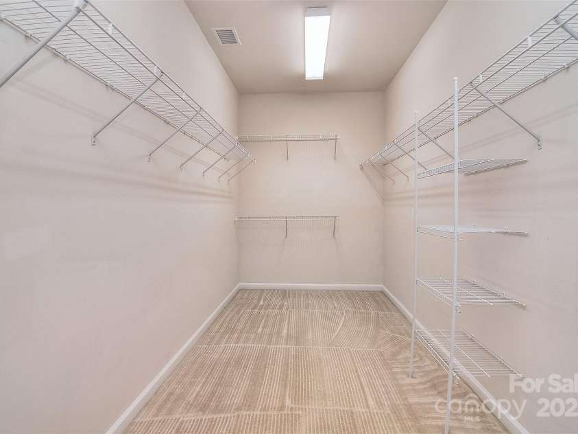 7206 Forrest Rader Drive, Mint Hill, NC 28227.  MLS# CAR4246731, YatesRealty ID 14182. LG WALK IN CLOSET FOR PRIMARY BR ON MAIN LEVEL
