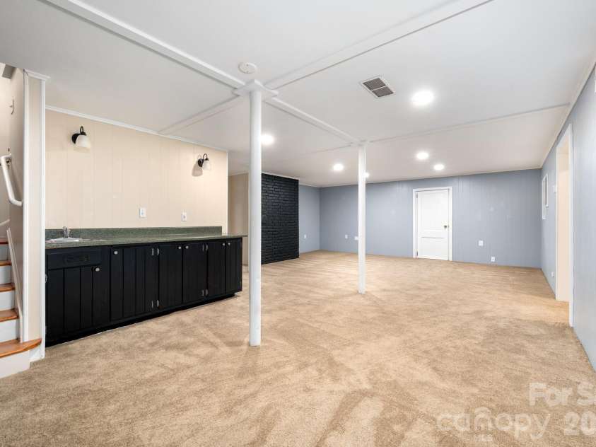 200 Allen Mountain Drive, Black Mountain, NC 28711.  MLS# CAR4329989, YatesRealty ID 14185. Basement has new flooring and is an amazing location for entertaining. Could be a great family/game room. 