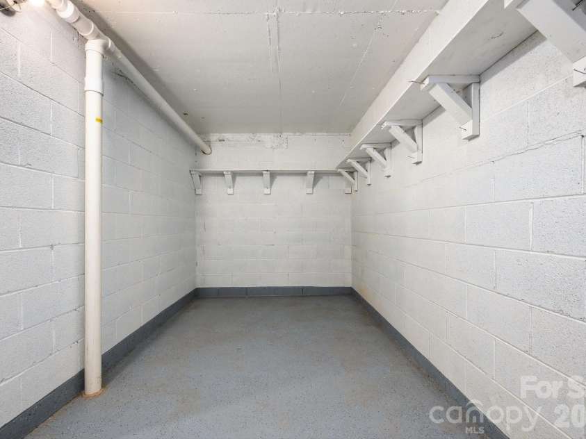200 Allen Mountain Drive, Black Mountain, NC 28711.  MLS# CAR4329989, YatesRealty ID 14185. Huge dry storage closet in the basement. 