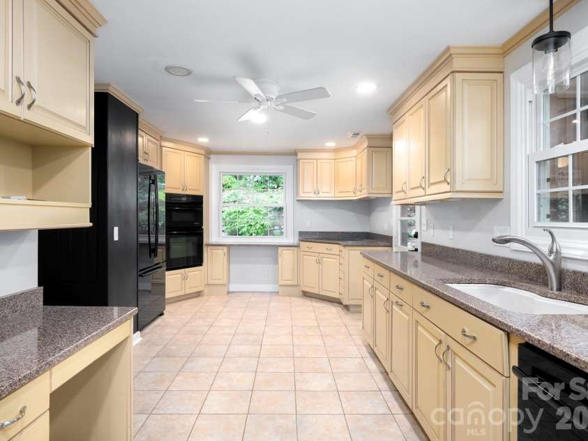 200 Allen Mountain Drive, Black Mountain, NC 28711.  MLS# CAR4329989, YatesRealty ID 14185. Large open updated kitchen offering lots of storage space. 