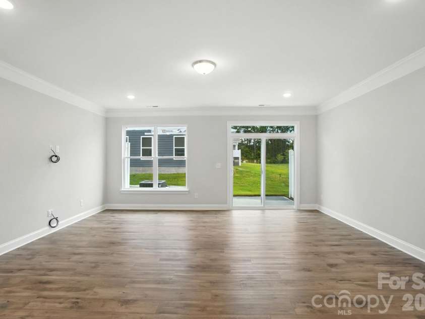 6266 Tea Olive Drive, Harrisburg, NC 28075.  MLS# CAR4251541, YatesRealty ID 14186. Family room