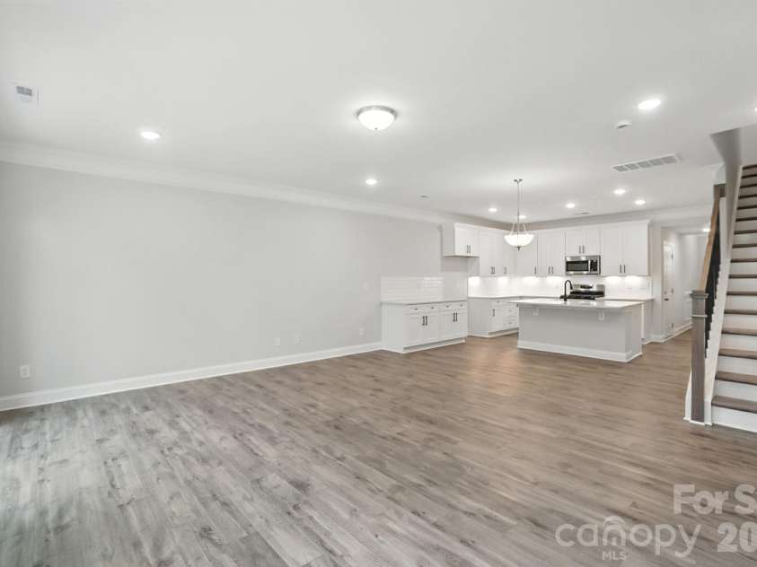 6266 Tea Olive Drive, Harrisburg, NC 28075.  MLS# CAR4251541, YatesRealty ID 14186. Family room