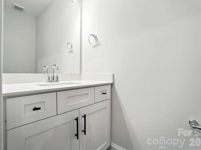 6266 Tea Olive Drive, Harrisburg, NC 28075.  MLS# CAR4251541, YatesRealty ID 14186. Half bath on the main