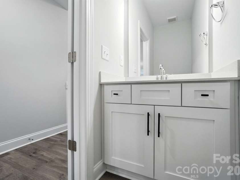 6266 Tea Olive Drive, Harrisburg, NC 28075.  MLS# CAR4251541, YatesRealty ID 14186. Half bath on the main