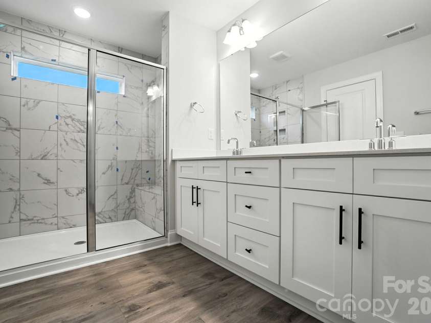 6266 Tea Olive Drive, Harrisburg, NC 28075.  MLS# CAR4251541, YatesRealty ID 14186. Primary bathroom