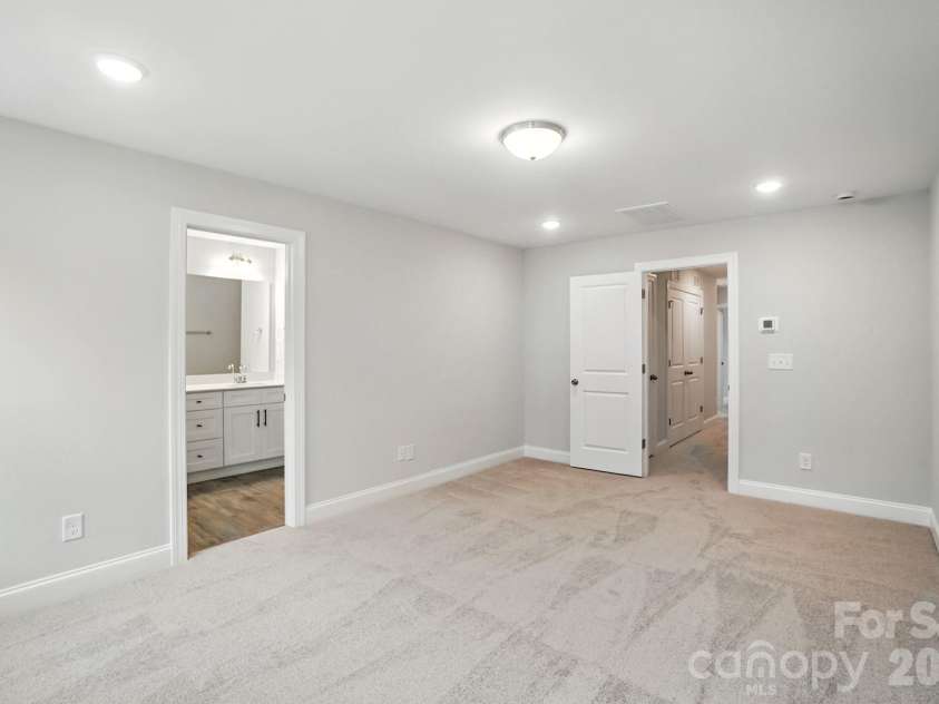 6266 Tea Olive Drive, Harrisburg, NC 28075.  MLS# CAR4251541, YatesRealty ID 14186. Primary bedroom