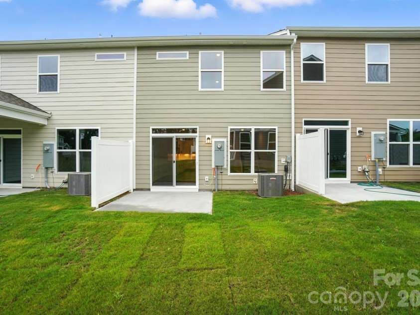 6266 Tea Olive Drive, Harrisburg, NC 28075.  MLS# CAR4251541, YatesRealty ID 14186. Rear of home