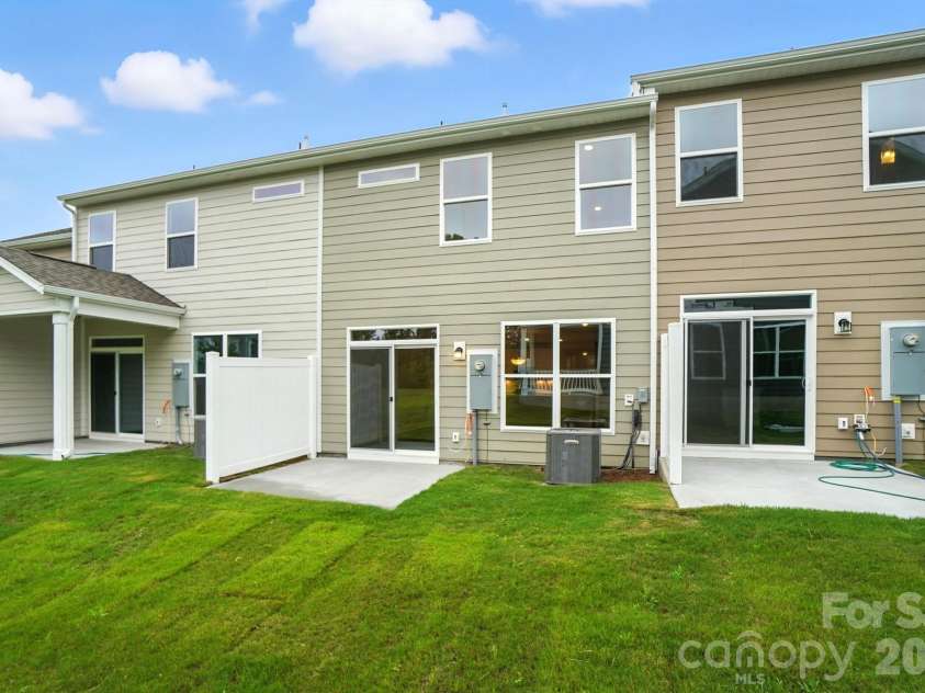 6266 Tea Olive Drive, Harrisburg, NC 28075.  MLS# CAR4251541, YatesRealty ID 14186. Rear of home