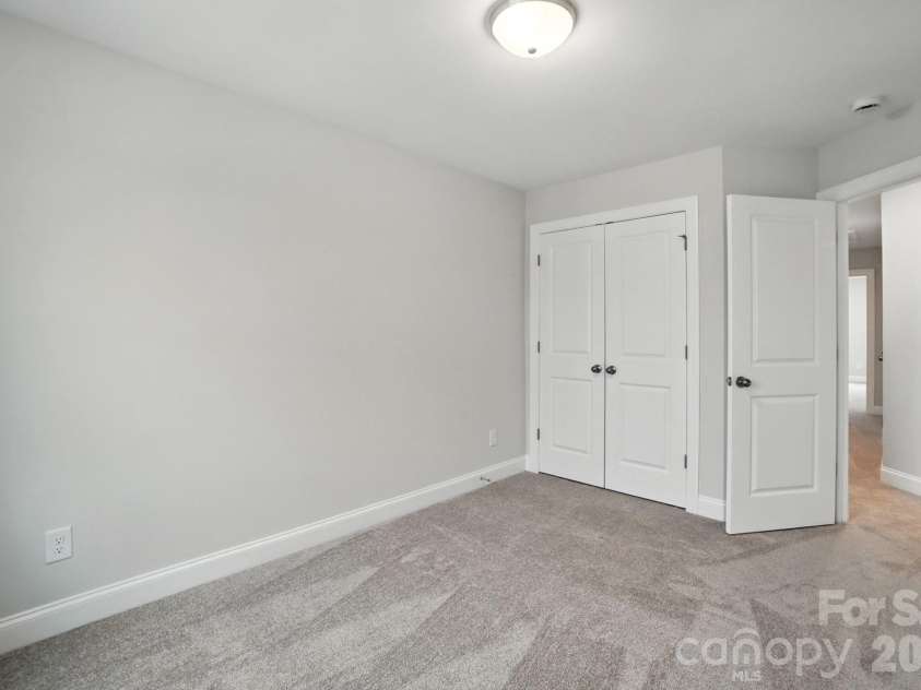 6266 Tea Olive Drive, Harrisburg, NC 28075.  MLS# CAR4251541, YatesRealty ID 14186. Secondary bedroom