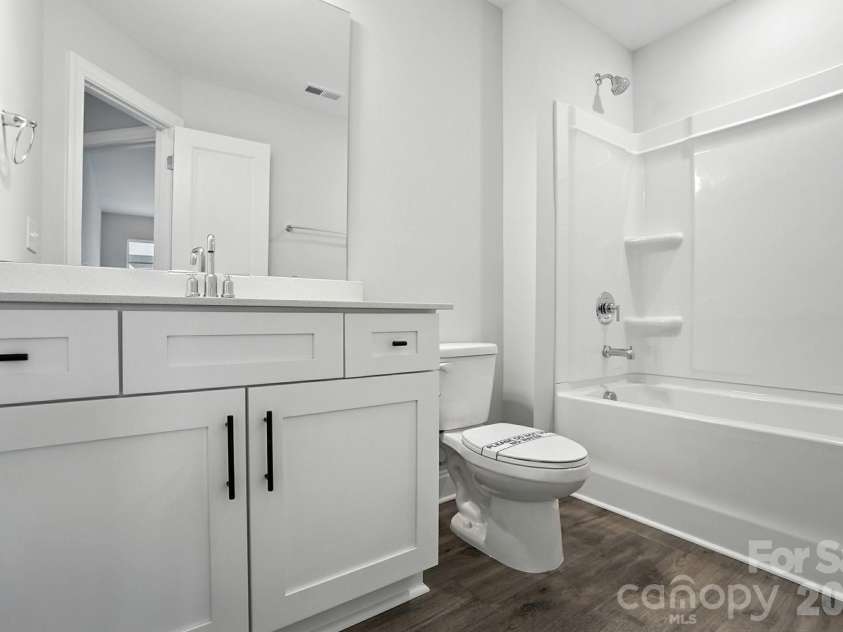 6266 Tea Olive Drive, Harrisburg, NC 28075.  MLS# CAR4251541, YatesRealty ID 14186. Upstairs full bathroom