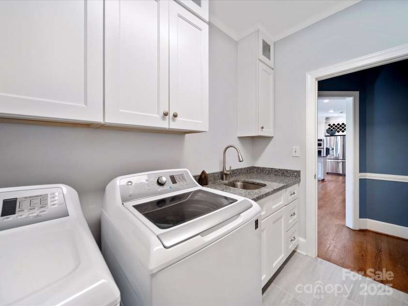 2217 Blue Bell Lane, Charlotte, NC 28270.  MLS# CAR4228161, YatesRealty ID 1419. Garage door to the right