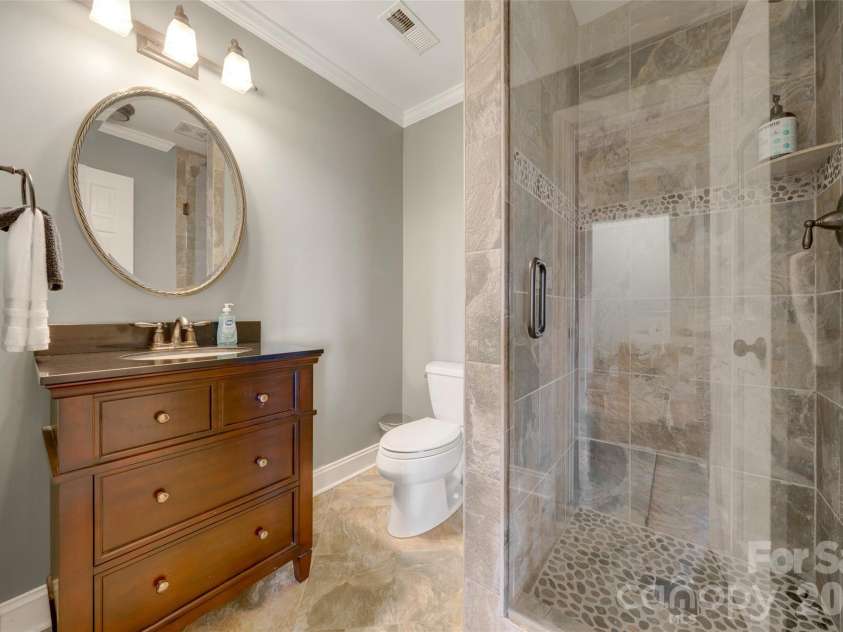300 Roberts Drive, Hendersonville, NC 28739.  MLS# CAR4320767, YatesRealty ID 14192. Basement bathroom