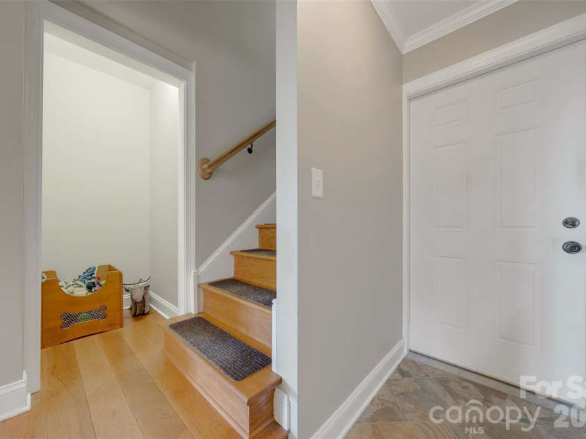 300 Roberts Drive, Hendersonville, NC 28739.  MLS# CAR4320767, YatesRealty ID 14192. Door to garage