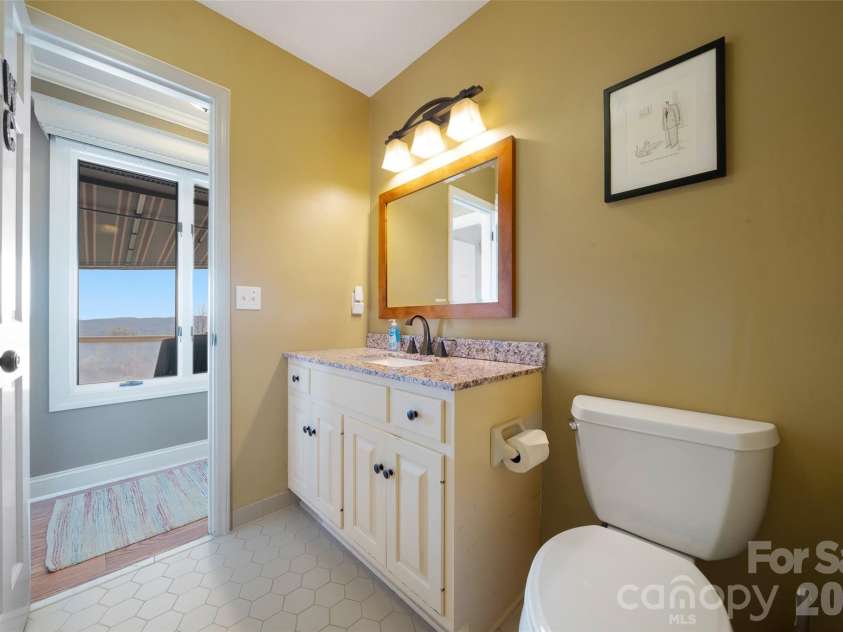 300 Roberts Drive, Hendersonville, NC 28739.  MLS# CAR4320767, YatesRealty ID 14192. Guest Bath