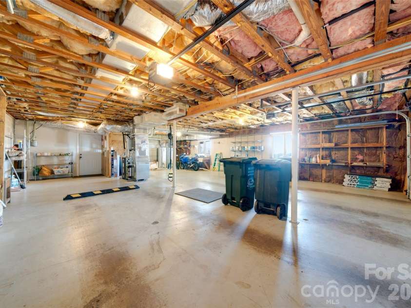 300 Roberts Drive, Hendersonville, NC 28739.  MLS# CAR4320767, YatesRealty ID 14192. Oversized 2 car garage attached to basement