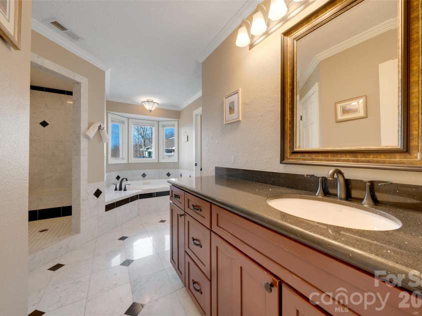 300 Roberts Drive, Hendersonville, NC 28739.  MLS# CAR4320767, YatesRealty ID 14192. Primary en suite