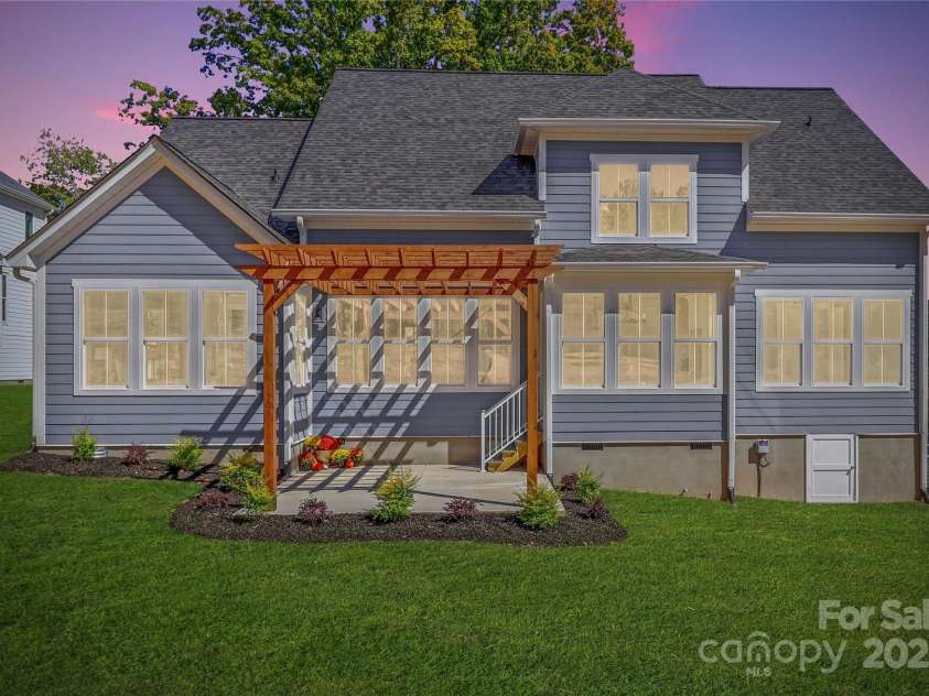 4265 Candlewood Drive, Sherrills Ford, NC 28673.  MLS# CAR4325234, YatesRealty ID 14192. This picturesque designer home has so many thoughtfully added elements to accent the home. The design showcases a blend of functionality and aesthetics, creating a warm and inviting space.
