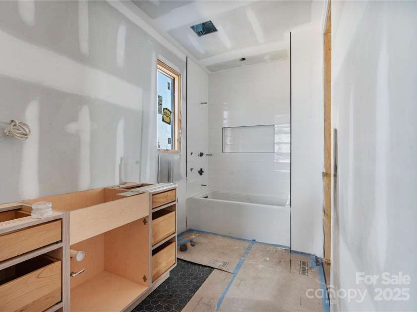 22554 John Gamble Road, Cornelius, NC 28031.  MLS# CAR4259378, YatesRealty ID 14195. Jack and Jill Bathroom between Bedrooms 2 & 3