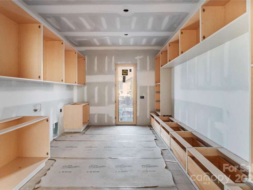 22554 John Gamble Road, Cornelius, NC 28031.  MLS# CAR4259378, YatesRealty ID 14195. Laundry Room