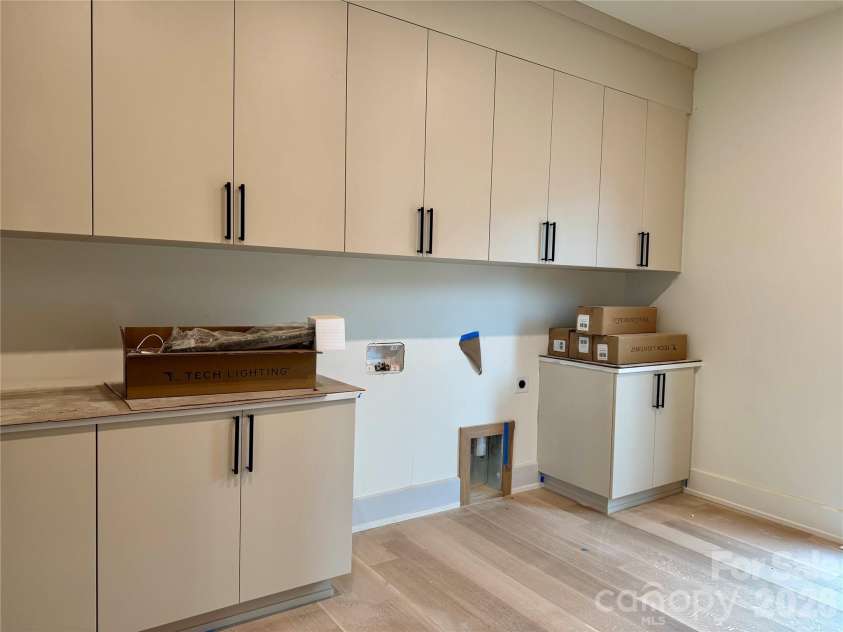 22554 John Gamble Road, Cornelius, NC 28031.  MLS# CAR4259378, YatesRealty ID 14195. Laundry Room