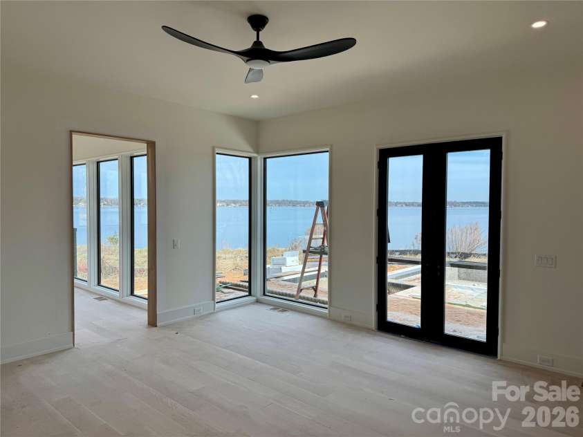 22554 John Gamble Road, Cornelius, NC 28031.  MLS# CAR4259378, YatesRealty ID 14195. Primary suite, Main Floor