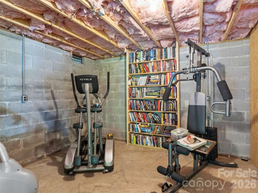 170 Mountain Farm Road, Burnsville, NC 28714.  MLS# CAR4362361, YatesRealty ID 14198. Unfinished basement