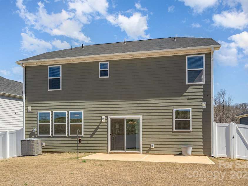 5013 Dunsford Drive, Denver, NC 28037.  MLS# CAR4235751, YatesRealty ID 14198. Back Exterior