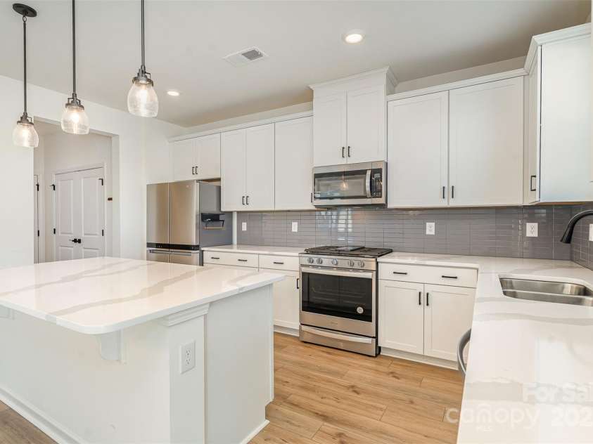 5013 Dunsford Drive, Denver, NC 28037.  MLS# CAR4235751, YatesRealty ID 14198. Kitchen with large island