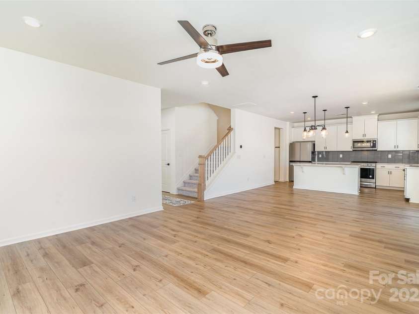 5013 Dunsford Drive, Denver, NC 28037.  MLS# CAR4235751, YatesRealty ID 14198. Open Floor Plan / Living area and kitchen