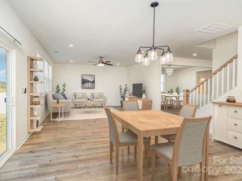 5013 Dunsford Drive, Denver, NC 28037.  MLS# CAR4235751, YatesRealty ID 14198. Virtually Staged Living Room and Eat-in Kitchen