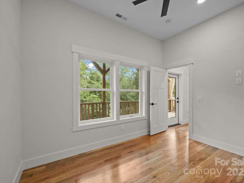 117 Third Street, Asheville, NC 28803.  MLS# CAR4293672, YatesRealty ID 1420. Lower level bedroom