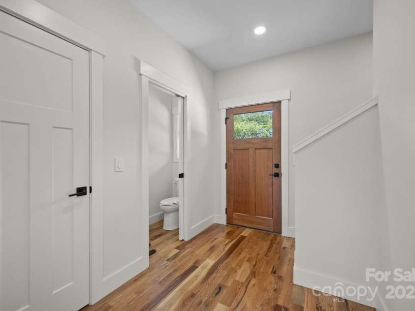 117 Third Street, Asheville, NC 28803.  MLS# CAR4293672, YatesRealty ID 1420. Main floor features a half bath