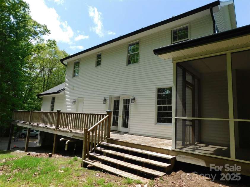 1064 Skye Drive, Pisgah Forest, NC 28768.  MLS# CAR4238839, YatesRealty ID 14202. Enjoy the warmth of the sun from the back deck.