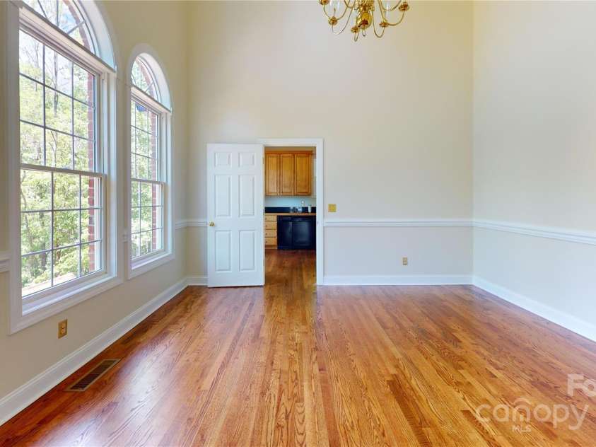 1064 Skye Drive, Pisgah Forest, NC 28768.  MLS# CAR4238839, YatesRealty ID 14202. Kitchen is just off dining room for easy access.