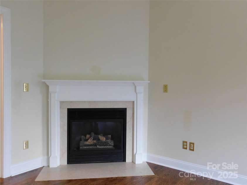1064 Skye Drive, Pisgah Forest, NC 28768.  MLS# CAR4238839, YatesRealty ID 14202. Lovely fireplace in primary bedroom.