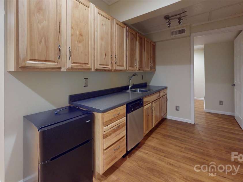 1064 Skye Drive, Pisgah Forest, NC 28768.  MLS# CAR4238839, YatesRealty ID 14202. Lower level kitchenette.