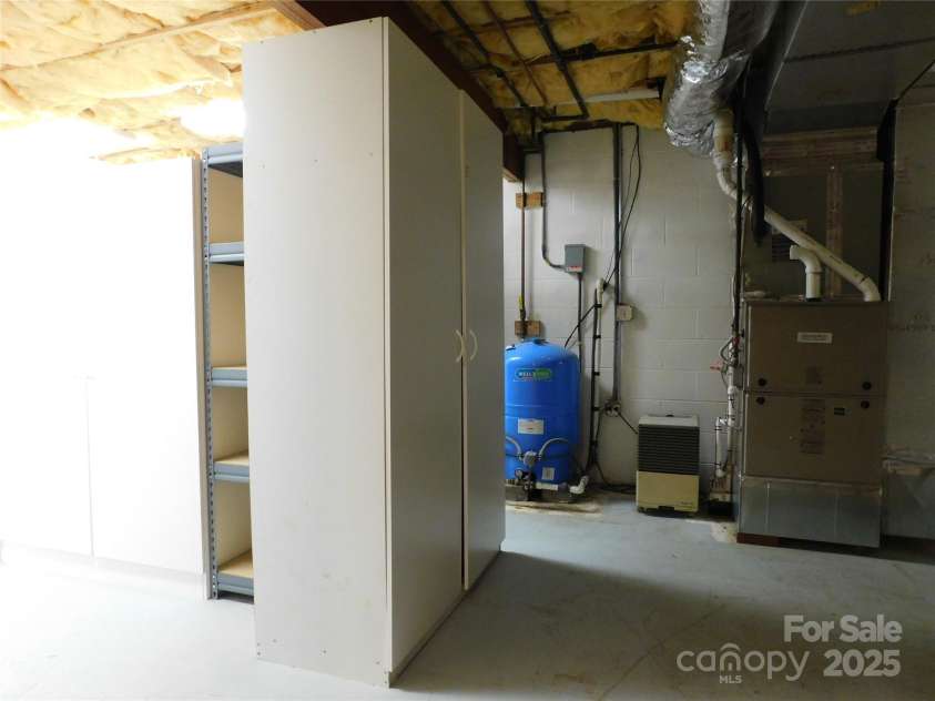1064 Skye Drive, Pisgah Forest, NC 28768.  MLS# CAR4238839, YatesRealty ID 14202. More storage!